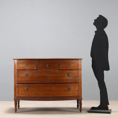 Demi-lune walnut chest of drawers with various wood trim. The front features five drawers, the first three of which are...