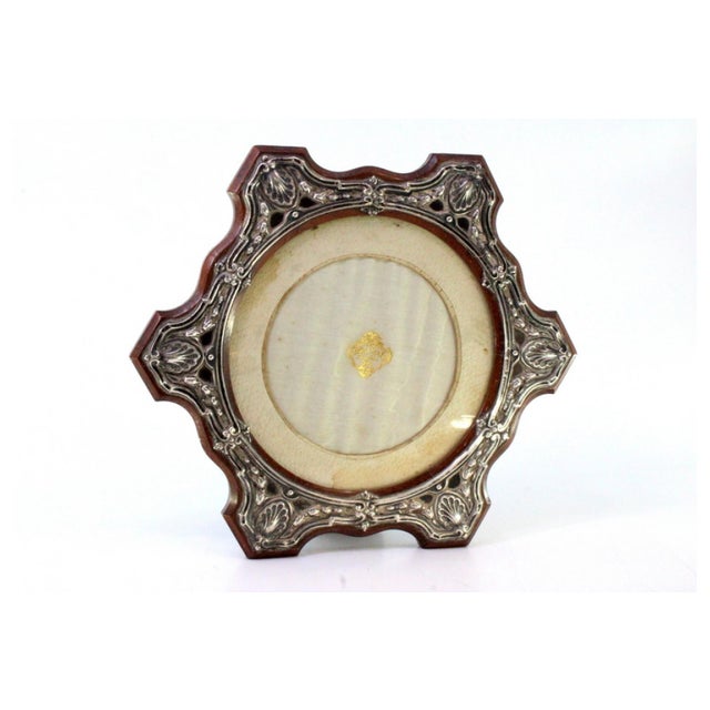 Wooden Frame with Silver Shell Applications and Support, in Very Good conditions. Designed 1890 to 1919 This piece has an...