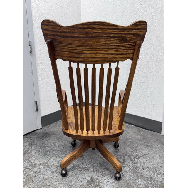 American Vintage H. W. Hull & Sons Tiger Oak Swivel Bankers Chair For Sale - Image 3 of 12