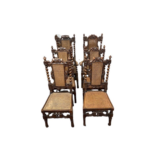 These are a set of 6 carved walnut chairs from England. They have a Braganza feet with barley twist columns and...