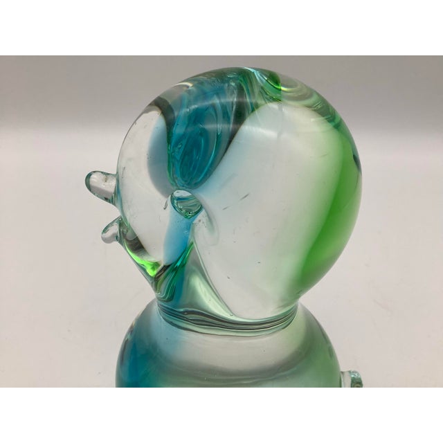 The adorable small glass bird was made in Canada. The base of the bird has an etching "Chalet Canada". The bird has no...
