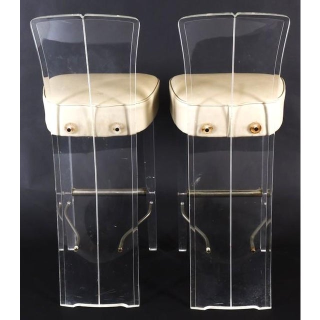 A pair of fabulous mid century modernist lucite bar chairs from Hill Manufacturing Co. (Newburgh NY). These chairs are...