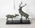 A striking Louis-Albert Carvin sculpture depicting a stag and doe with remarkable movement and naturalistic detail. Known...