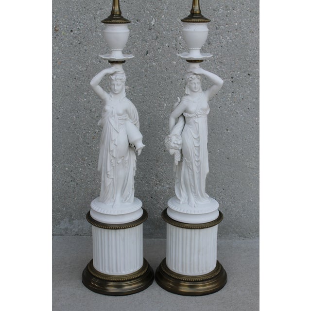 Pair of porcelain or Parian ware (is a type of biscuit porcelain imitating marble) Greek goddess lamps. One is Demeter,...