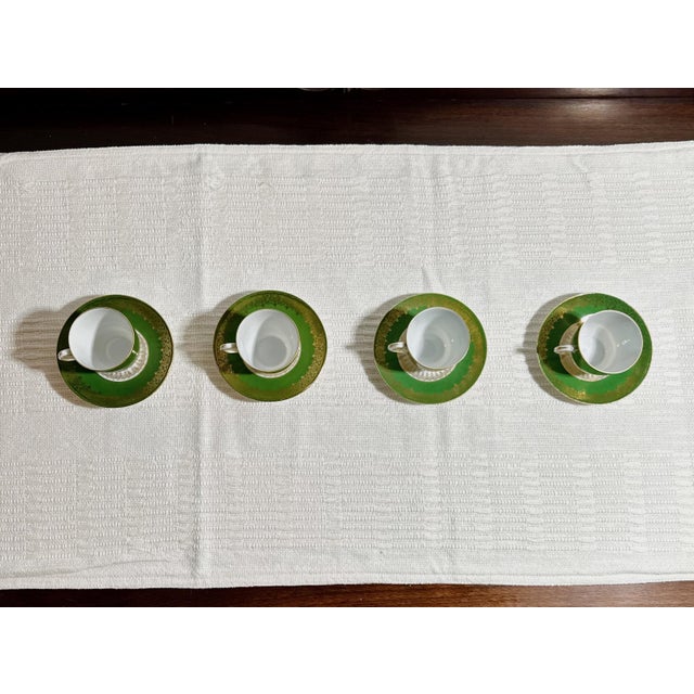 This eight‑piece set from Victoria Carlsbad, Austria, comprises four teacups and four saucers. Each porcelain piece...