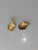 Sometimes mistakenly referred to as peacock, these earings are of the late 20th century