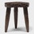The round top of this rustic, tri-leg side table is an antique wooden wheel, repurposed from an early 20th century ox-...