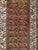 "This Malayer runner from the early 20th century is a piece of quiet, enduring beauty — an overall design of repeated tree...