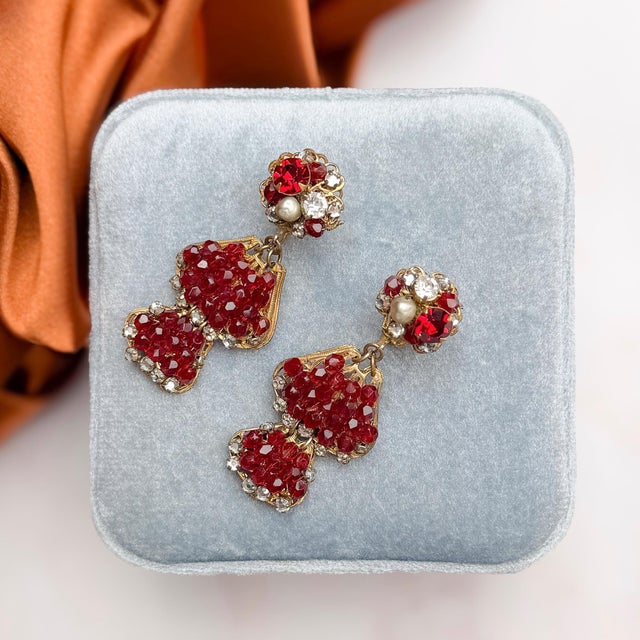 These striking and beautifully crafted clip on earrings were created in the 1950s by Robert DeMario. Condition Report:...