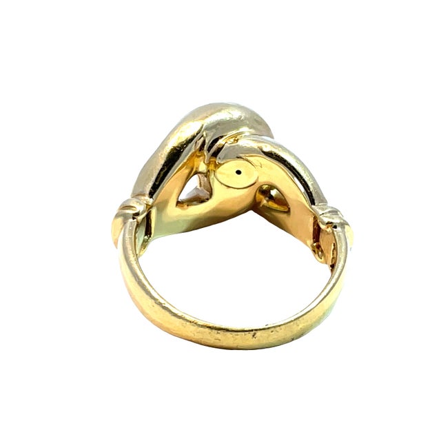 Elevate your jewelry collection with this exquisite 14k yellow gold link design ring, featuring a stunning knot motif that...