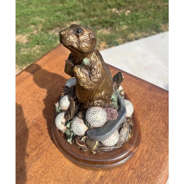 Rare Limited Edition #53/125 "In the Rough" bronze golf gopher sculpture by E.C. Wynne. Depicts a gopher holding a golf...