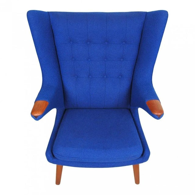 Hans j. Wegner papa bear chair newly upholstered with blue hallingdal 180 square fabric and with newly renovated legs and...