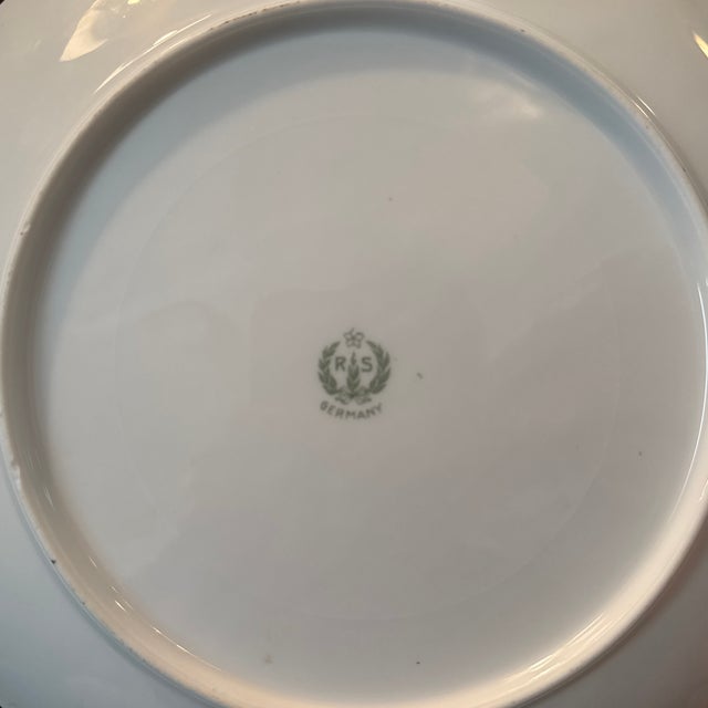 Add a touch of early 20th-century elegance to your tabletop or display cabinet with this authentic Reinhold Schlegelmilch...