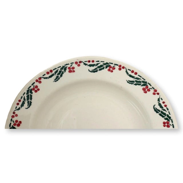 Deck the halls—and the table. This charming set of six French creamware bowls features a classic holly motif, adding just...