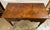 Antique writing desk or vanity. Burl wood top and drawer fronts. All original hardware and wheels. Dovetail joint...