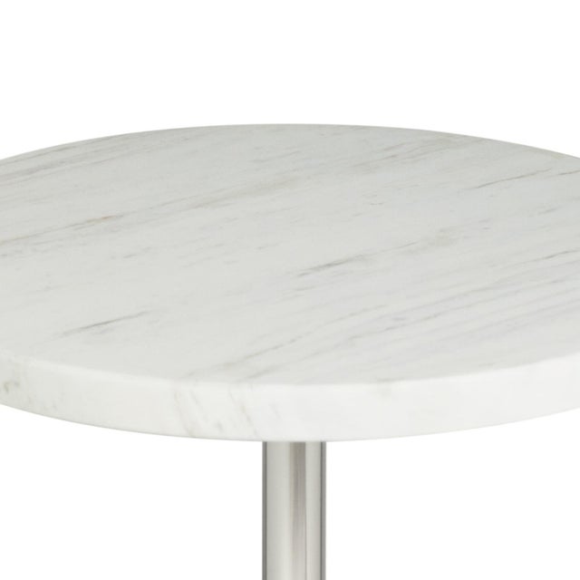 A beautiful footnote to any sophisticated room, the Arthur Accent Table features a round marble top paired with a modern,...