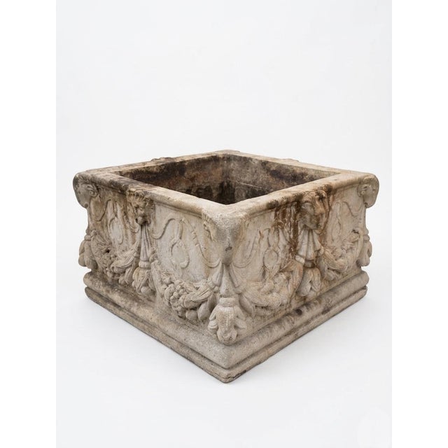 This exquisite vintage cast stone planter serves as a commanding architectural statement for both interior and exterior...