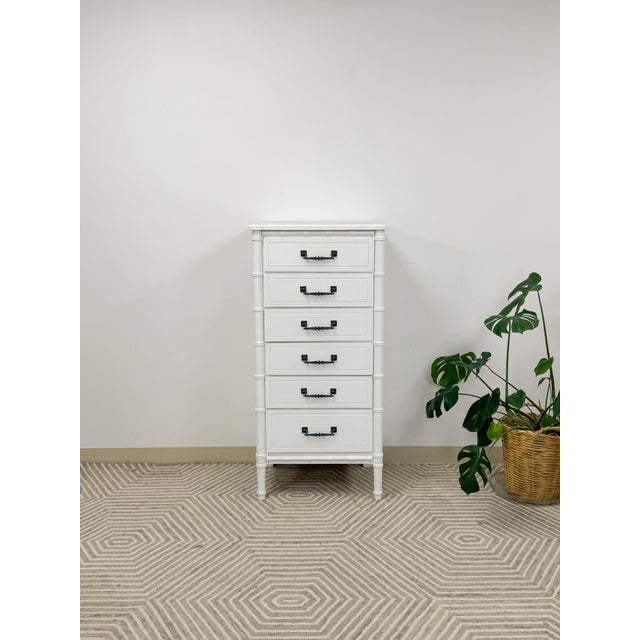 This elegant vintage Henry Link style lingerie chest is a refined and practical Hollywood Regency bedroom find. The tall,...