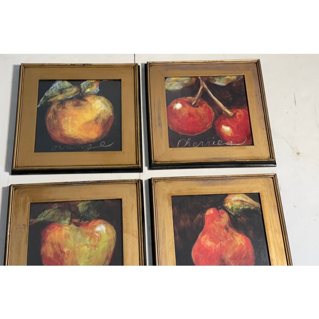 Set of 4 vintage Chromolithographs with fruit images n wide gold tone frames.