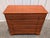 Elevate your space with this vintage Whitney solid cherry wood 4-drawer chest of drawers, a magnificent showcase of...