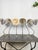 Beautiful set Dutch mirrored wall sconces constructed out of mercury glass with brass and steel fixtures. These lights...
