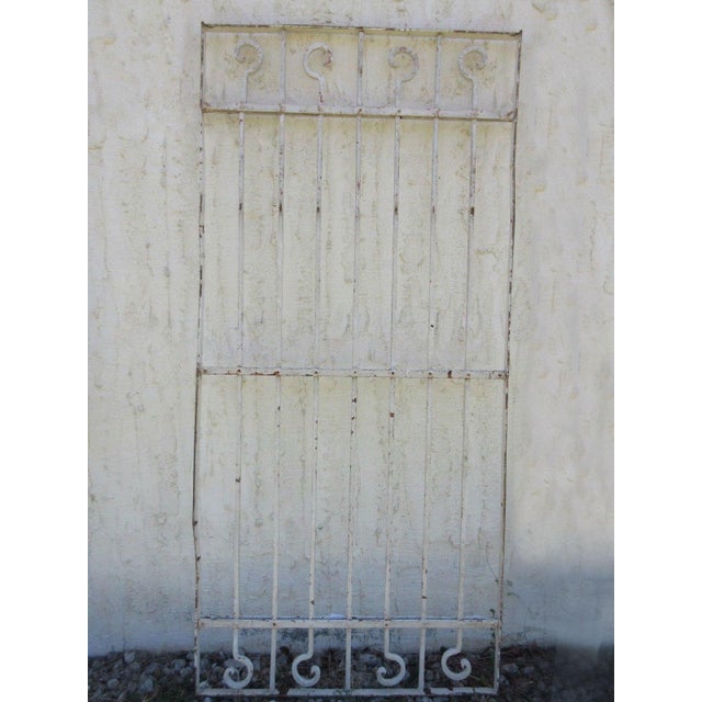 A piece of architectural salvage. Heavy and sturdy. Piece does show signs of age related wear including rust, flaking...