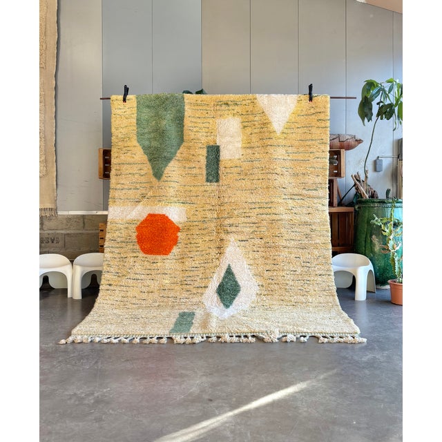 Prepare to be captivated by the sheer elegance and artisanal excellence of our Modern Handwoven Moroccan Beni Ourain...