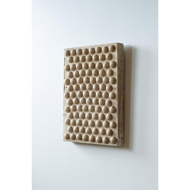 Striking geometric wall plaque made from plaster. By unknown designer and maker. Done sometime around the early 20th...