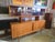 High Quality Vintage Danish Teak 2 Piece Sideboard has upper tier hutch with 2 sliding glass doors and shelves. Credenza...
