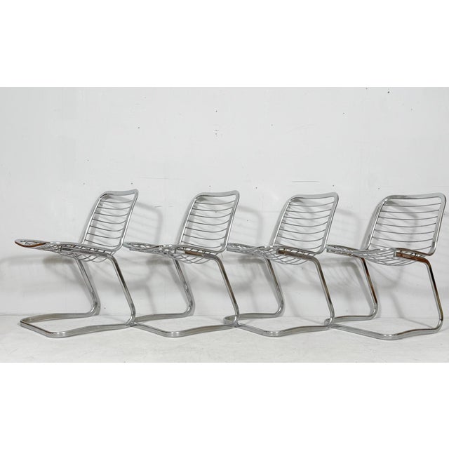 Set of 4 cantilever chairs, model: 'sabrina', 1970s, italy, construction of chromed steel wire and steel tubing,...