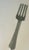 ,large display wall decor restaurant advertisement polished metal fork.