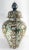 We are selling this large decorative Japanese Imari style vase. This vase has unusual decoration with gilded blue panels...