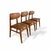 A stylish set of three Schreiber dining chairs, showcasing classic mid century proportions with softly shaped backs and...