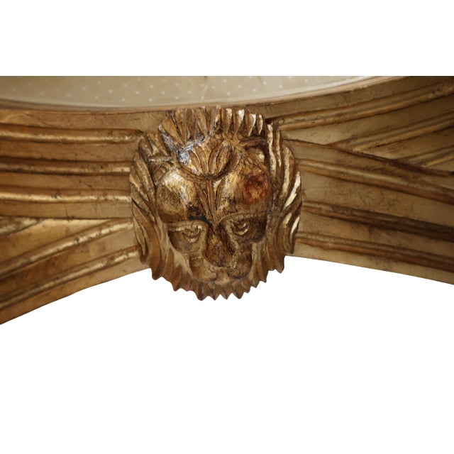 An exceptionally uncommon pair of sculptural giltwood curule benches by Henredon, created with the substantial...