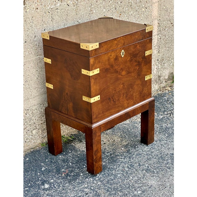 This burl wood box on stand is such a versatile table, it can be next to a sofa or between the chairs. It offers a lot of...