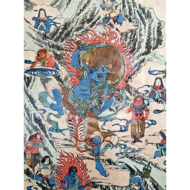 Japanese deities framed woodblock print, colored inks on paper, in a contemporary black frame and archivally mounted with...