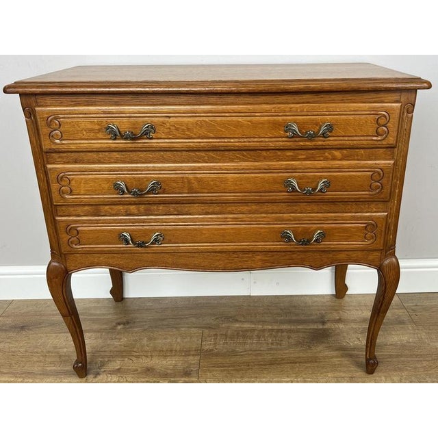 Add timeless French elegance to your home with this Vintage French Louis chest of drawers , beautifully crafted from oak ....