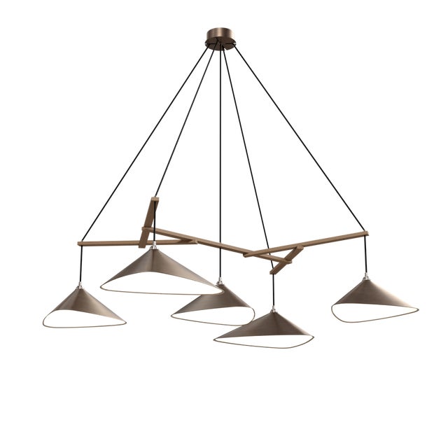 Emily is a series of handmade sheet steel lampshades in various finishes and spatial arrangements. _ Emily was inspired by...