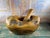 Carved from a single monumental block of olive wood, this large mortar and pestle is both a functional object and a...