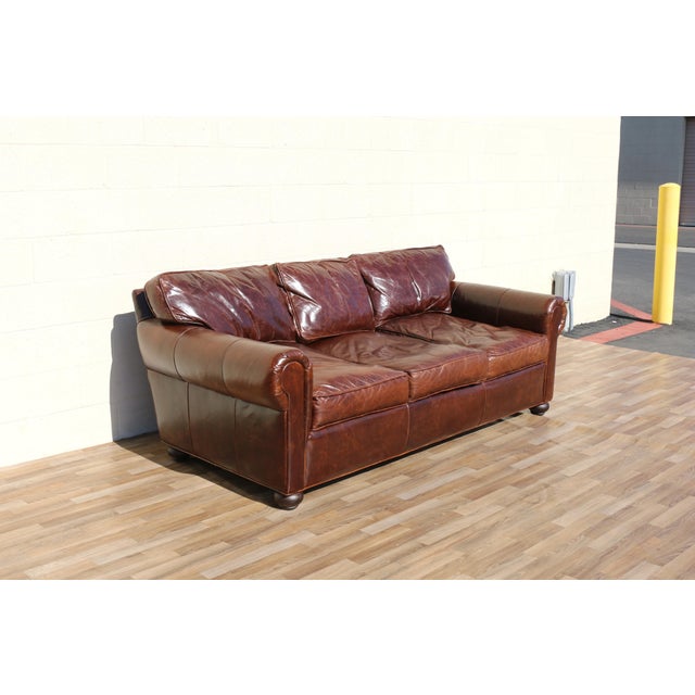 Bring timeless comfort and classic design into your home with this Vintage Restoration Hardware Distressed Brown Leather...