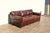 Bring timeless comfort and classic design into your home with this Vintage Restoration Hardware Distressed Brown Leather...