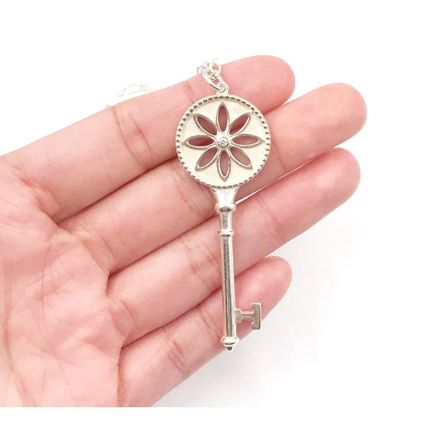 Tiffany and Co. Tiffany & Co 925 Silver Large Daisy Key Pendant With Diamond Necklace For Sale - Image 4 of 5