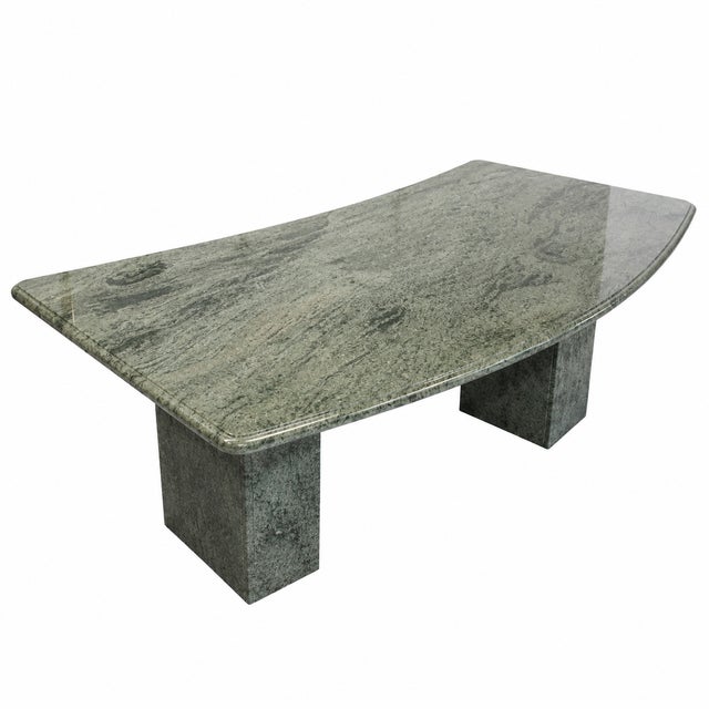 This desk is cut from a single solid slab of Verde Maritaca premium granite, custom-fabricated at the stone yard. The 84”...