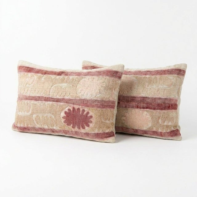 This beautiful 16'' x 24'' & 17'' x 24'' hand-embroidered Suzani pillow cover set was made from authentic Uzbek cotton...
