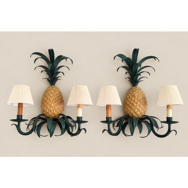 Offered is a vintage pair of Currey & Company wall lights. These pineapple wall lights were acquired from a Naples estate.
