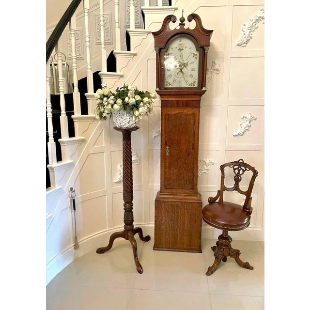 Antique george iii mahogany and oak longcase clock by hudfon of nottingham having a quality inlaid swan neck pediment and...