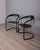 Pair of black metal chairs with black leather seats, "Canasta" model, designed by Arrben Italy, 1970s. I have official...