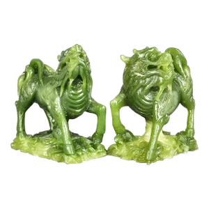 Early 20th Century Pair of Vintage Chinese Foo Dog Statues in Jade Color