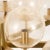 2010s Early 21st Century Brass Sunburst Style Chandelier with Glass Globes For Sale - Image 5 of 13