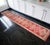 This exceptional 1970s runner, hand-knotted in Southeastern Anatolia, brings a vibrant, soulful narrative to contemporary...